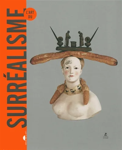 Reference books on Surrealism and on typographic choice, stacked on a desk